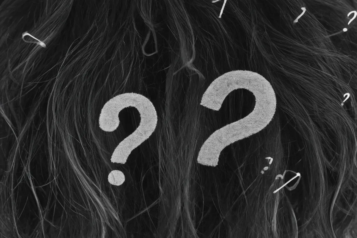 Imagen en blanco y negro con diseño de láser e interrogativas